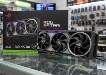 ASUS ROG Astral GeForce RTX 5090 graphics card and retail box displayed on a glass counter in a hardware store.