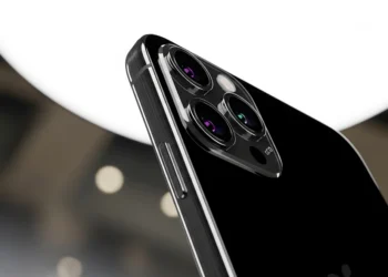 Left leaning profile of the iPhone 16 Pro in Black Titanium showcasing the vertical rails and hardware required to bridge the iphone 16 pro software gap.