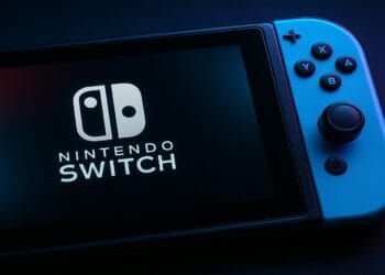 Nintendo Switch console showing white logo on a dark screen.